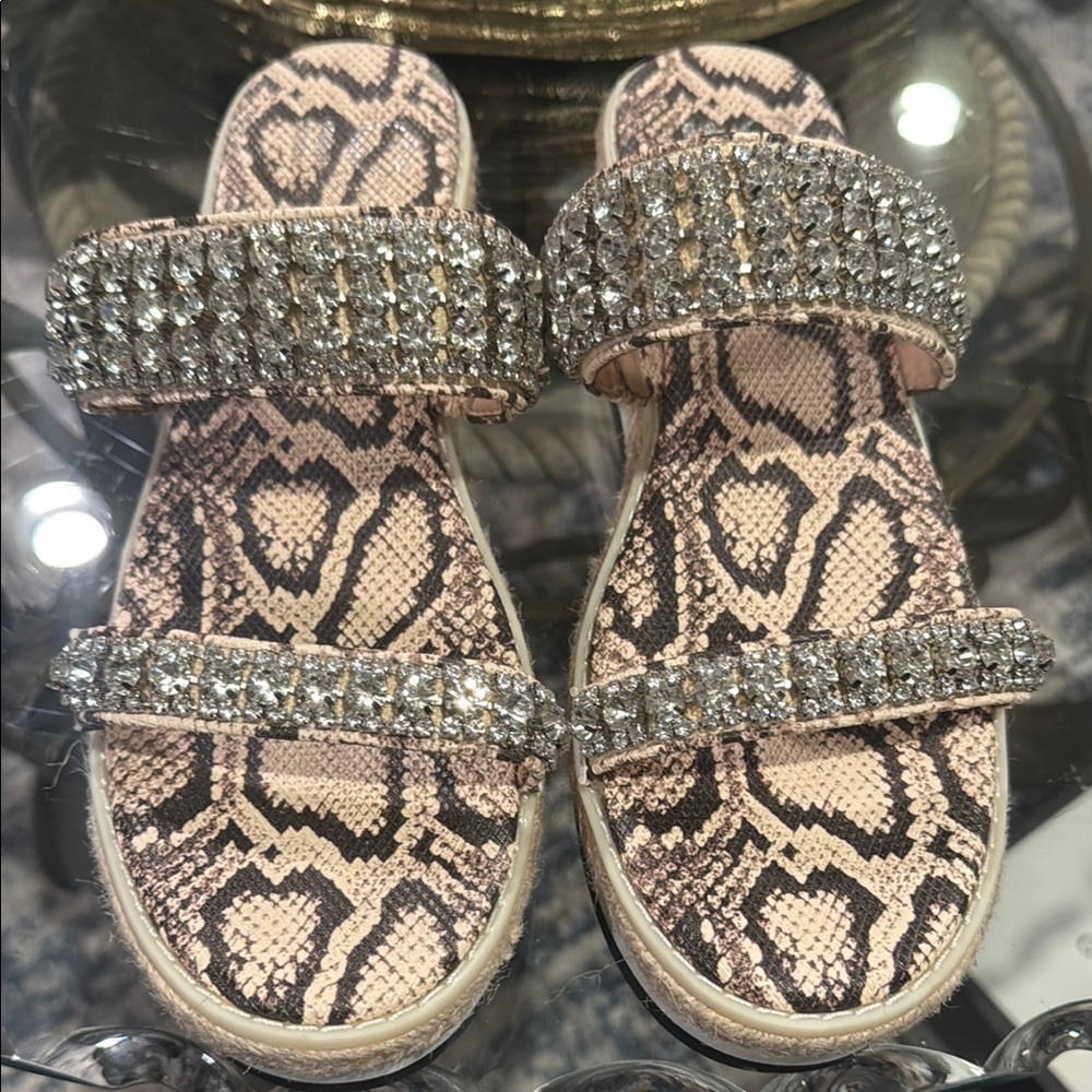 Jennifer Lopez Pink and Silver Sandals with Elegant Design
